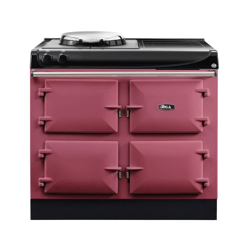 AGA Herd mit vier Türen in Pink und schwarzer Kochplatte – hochwertiger Küchenherd Pinkfarbener AGA Herd mit vier Backofentüren und schwarzer Kochplatte, freigestellt auf weißem Hintergrund