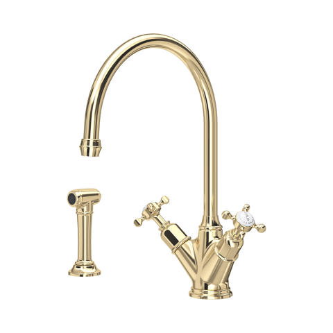 Polierte Messing-Spültischarmatur in Goldoptik mit Hochbogen-Auslauf, 2-Griff-Bedienung und separater Seitenbrause; klassischer Stil für die Küche, präzise Regelung von Temperatur und Durchfluss