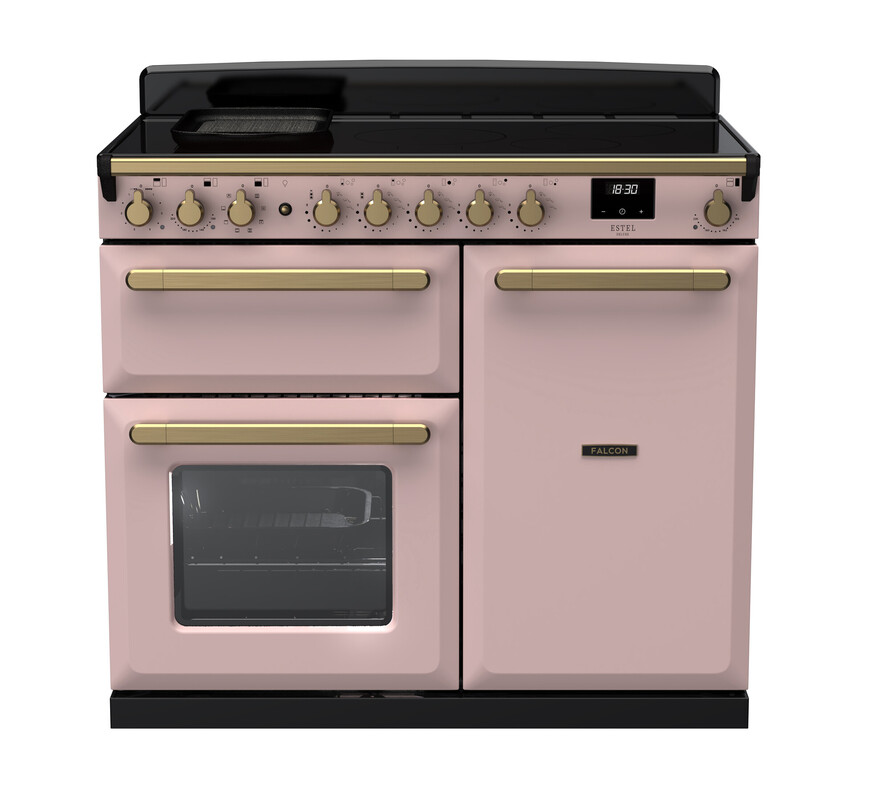 Ein stilvoller, rosa Küchenherd im Retro-Design mit goldfarbenen Griffen, zwei Backöfen und einer Kochplatte.
