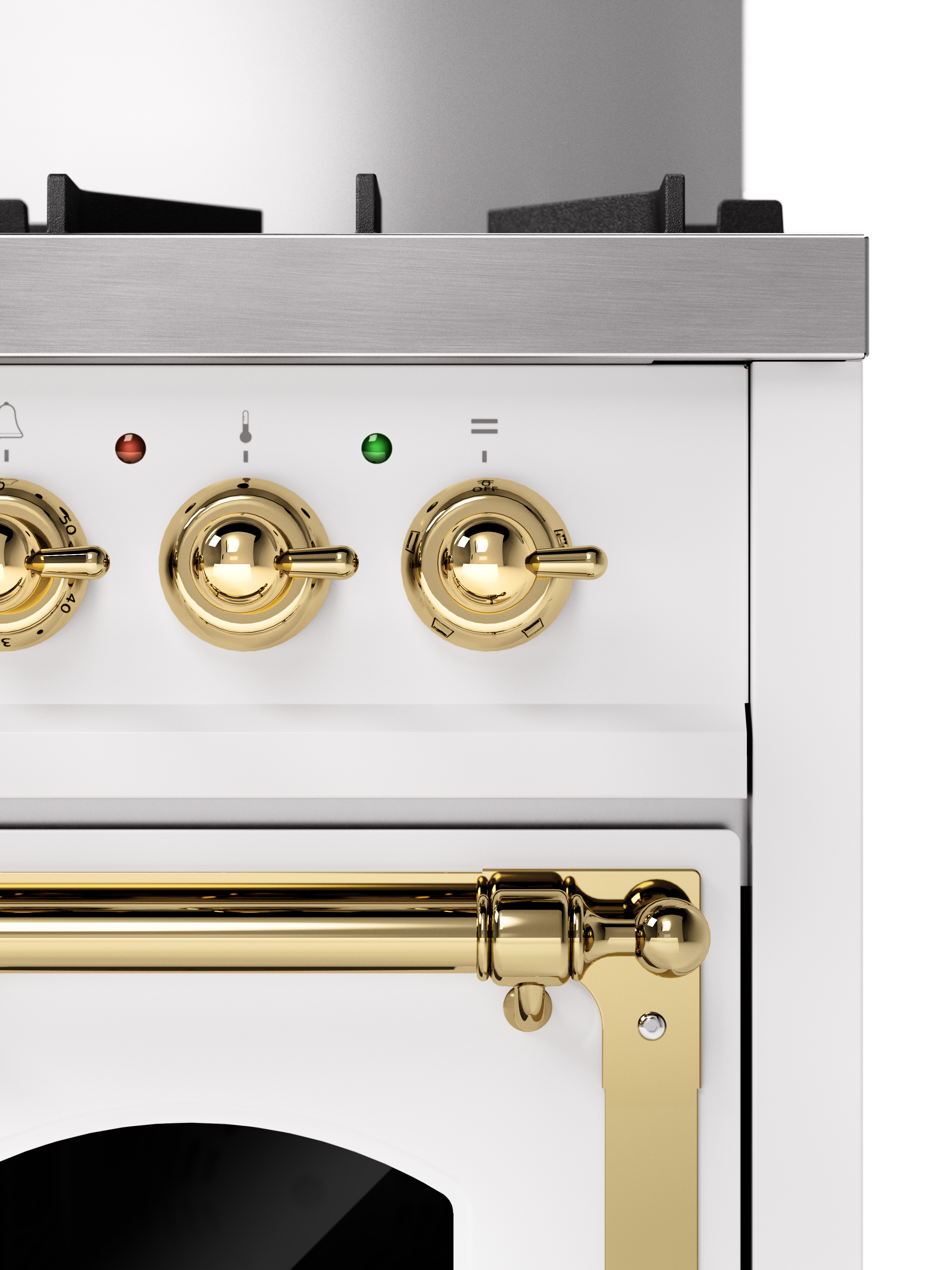 Detailansicht eines weißen Gasherds mit goldfarbenen Bedienelementen und Griffen Weiße Front eines Gasherds mit goldfarbenen Drehknöpfen, Griff und Bedienblende