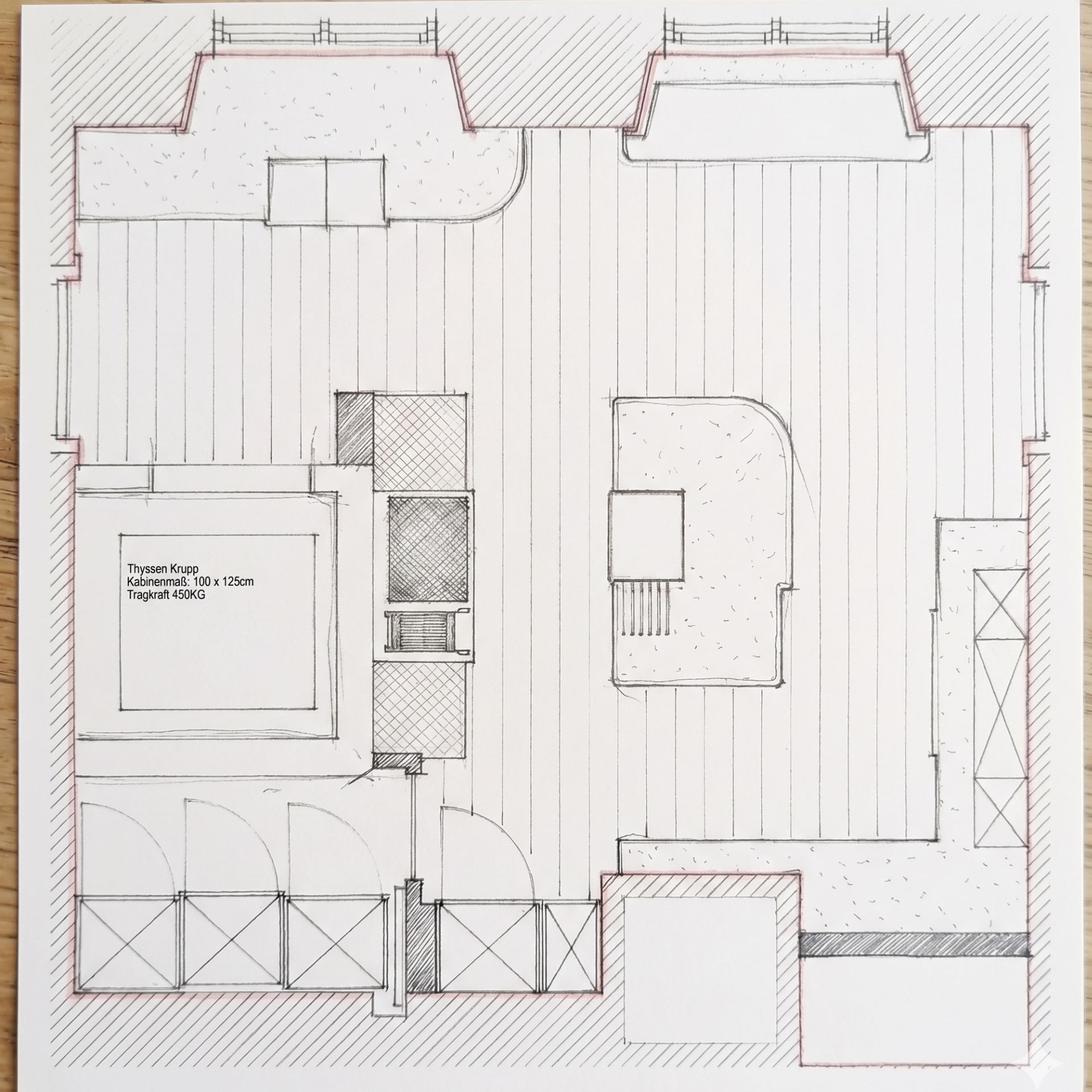 Technische Skizze eines Aufzug-Grundrisses mit Markierung: Kabinenmaß 100 x 125 cm, Tragkraft 450 kg; ideal als Planungsunterlage für Liftinstallation in Gebäuden.