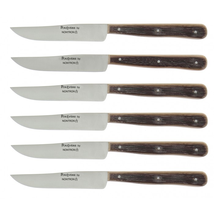 Set aus 6 Steakmessern NONTRON Poulvère mit Holzgriff – traditionelles Besteck Sechs Steakmesser NONTRON Poulvère mit Holzgriff nebeneinander, klassische Form, traditionelle französische Handarbeit