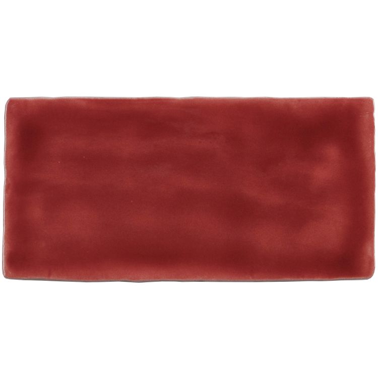 Rote rechteckige Fliese mit glänzender Glasur